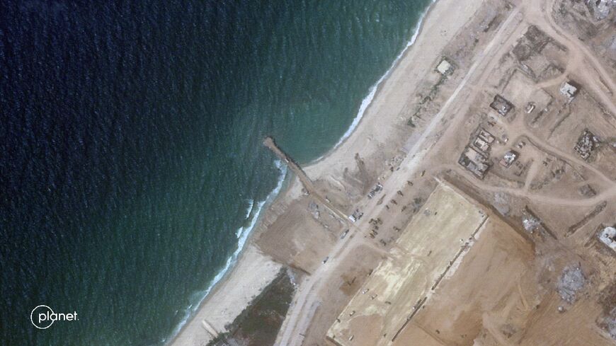 This handout satellite picture from Planet Labs PBC taken on April 18, 2024 shows a temporary jetty on Gaza's coast which was used in March to provide food aid ferried by sea to the besieged Palestinian territory