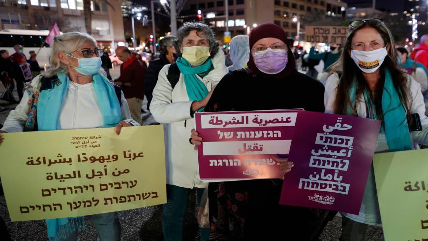 Israelis and Arab-Israelis take part in a march to honor those killed in organized crime and call on the police to curb the wave of intra-community violence, Tel Aviv, Israel, March 18, 2021. 