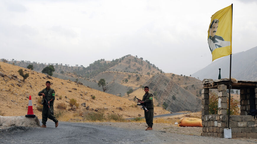 Kurdistan Workers Party (PKK) rebels man a security checkpoint on Oct. 28, 2009 near a PKK base in the Qandil mountains, near Rania province, in northern Iraq. 