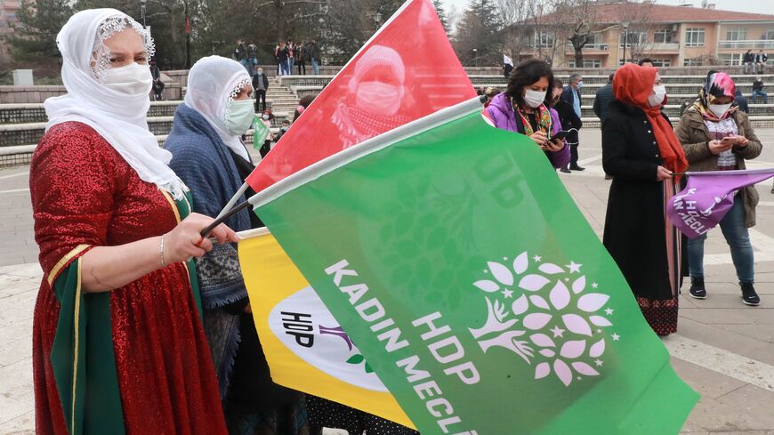 women wave hdp flags at newroz