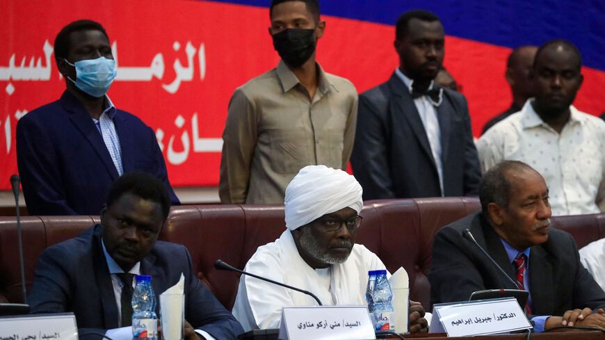 Head of the Sudan Liberation Movement and governor of Darfur Mini Minawi (L).
