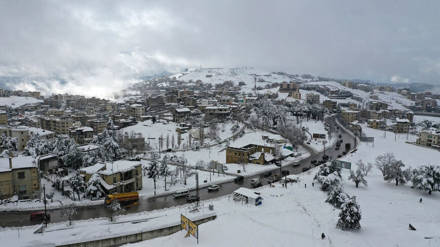 Snow blankets the area of Mdeirej, in the mountains east of Beirut, Lebanon, Feb. 18, 2021.