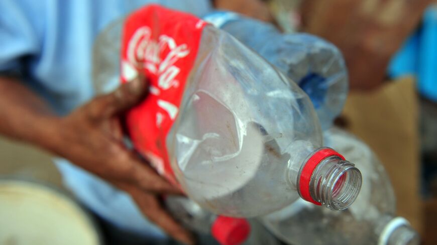 Plastic Coca-Cola bottles.