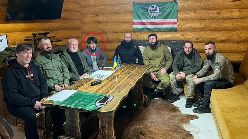 Abdul Hakim al-Shishani, commander of the Ajnad al-Kavkaz group (circled in red) with a Chechen fighting unit, Oct. 15, 2022.