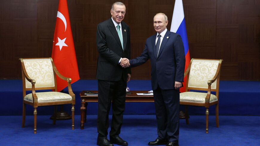 Russian President Vladimir Putin meets with Turkey's President Recep Tayyip Erdogan on the sidelines of the Sixth Summit of the Conference on Interaction and Confidence Building Measures in Asia (CICA) in Astana on Oct. 13, 2022.