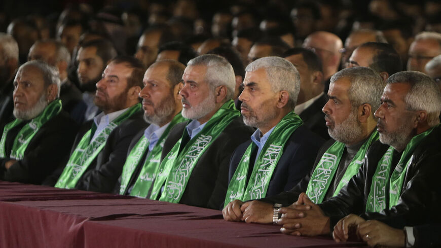 Yahya Sinwar (3rd R), the new Hamas leader in the Gaza Strip, and senior political leader Ismail Haniyeh (4th R) sit among other Hamas officials during a memorial for Mazen Faqha, a leader of the Islamist movement who was shot dead in Gaza by unknown gunmen, Gaza City, Gaza Strip, March 27, 2017.