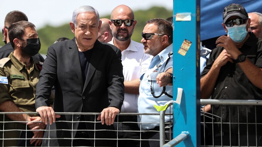 Israeli Prime Minister Benjamin Netanyahu visits the site where dozens were killed in crush at a religious festival, Mount Meron, April 30, 2021.