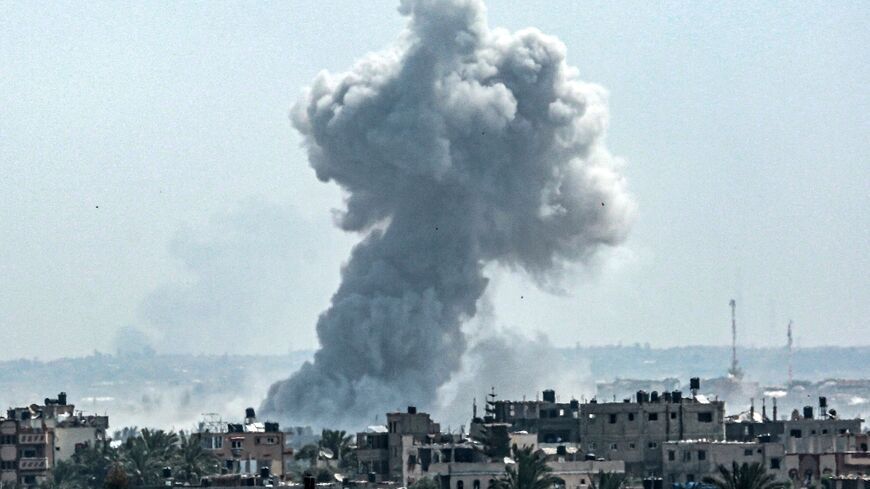 Smoke rises over central Gaza after Israeli shelling on the 200th day of the war