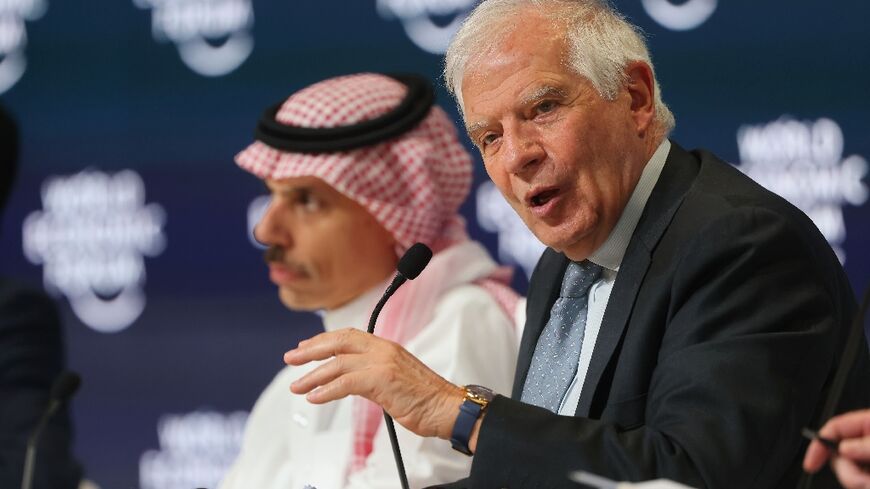 EU foreign policy chief Josep Borrell speaks next to Saudi Foreign Minister Prince Faisal bin Farhan at a World Economic Forum meeting in Riyadh on April 28, 2024