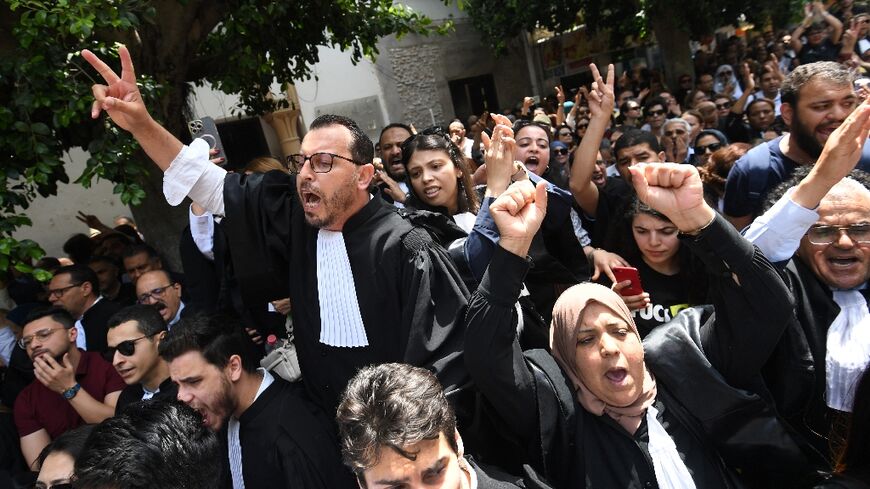 Lawyers chant anti-Saied slogans outside the main courthouse in Tunis