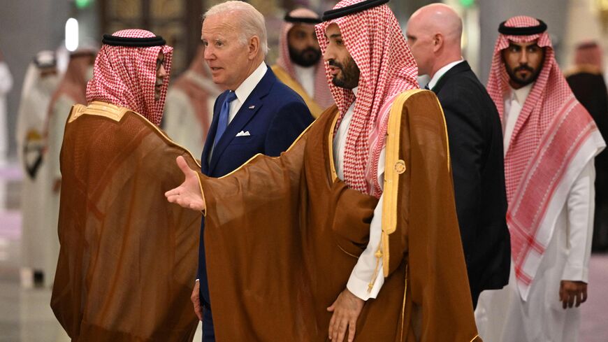 TOPSHOT - US President Joe Biden (C-L) and Saudi Crown Prince Mohammed bin Salman (C) arrive for the family photo during the Jeddah Security and Development Summit (GCC+3) at a hotel in Saudi Arabia's Red Sea coastal city of Jeddah on July 16, 2022. (Photo by MANDEL NGAN / POOL / AFP) (Photo by MANDEL NGAN/POOL/AFP via Getty Images)