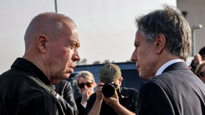 US Secretary of State Antony Blinken (R) stands with Israeli Defence Minister Yoav Gallant (L) at the Kerem Shalom border crossing with the Gaza Strip in southern Israel on May 1, 2024 