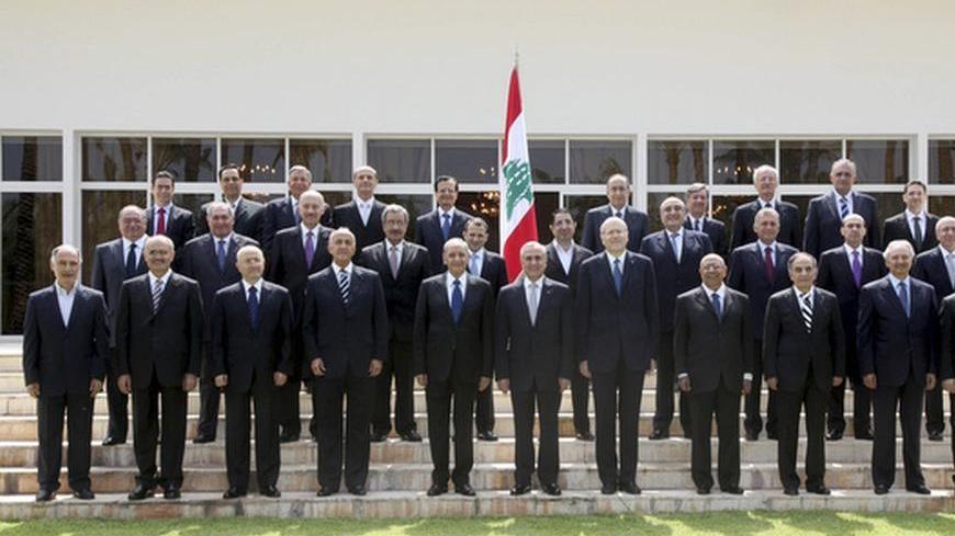 FOR EDITORIAL USE ONLY. NOT FOR SALE FOR MARKETING OR ADVERTISING CAMPAIGNS. THIS IMAGE HAS BEEN SUPPLIED BY A THIRD PARTY. IT IS DISTRIBUTED, EXACTLY AS RECEIVED BY REUTERS, AS A SERVICE TO CLIENTS.
Members of Lebanon's new cabinet pose for an official group photo at the presidential palace in Baabda, near Beirut June 15, 2011. The members are: (front row L-R) Minister of State Mohammad Fneish, Minister of Health Ali Hassan Khalil, Minister of Public Works and Transport Ghazi Aridi, Deputy Prime Minister 