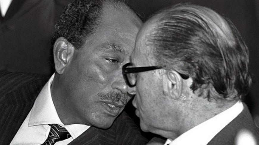 FILE PHOTO 20NOV77 - FOR RELEASE WITH BC-ISRAEL-ANNIVERSARY-CHRONOLOGY - Egyptian President Anwar Sadat (L) head to head with Israeli Prime Minister Menachem Begin in 1977 when Sadat made his historic visit to Jerusalem, becoming the first Arab leader to visit the Jewish state since its birth in 1948. Sadat and Begin went on to hold secret talks at Camp David with United States President Jimmy Carter and eventually signed a peace treaty in March 1979.

REUTERS