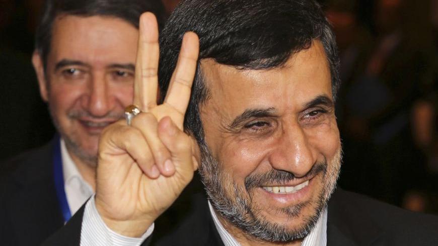 Iranian President Mahmoud Ahmadinejad gestures to photographers after meeting with Indonesian counterpart Susilo Bambang Yudhoyono in Nusa Dua, Bali November 9, 2012. Ahmadinejad said on Thursday the age of nuclear deterrence was long gone and any country still stockpiling nuclear weapons was "mentally retarded". He again denied Iran was trying to develop nuclear weapons, a day after the re-election victory of U.S. President Barack Obama, for whom Tehran's disputed nuclear programme will be one of the thorn