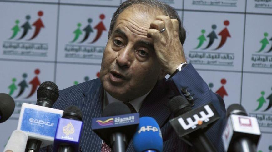 Mahmoud Jibril, head of the National Forces Alliance, speaks during a news conference at his headquarters in Tripoli July 8, 2012. REUTERS/Zohra Bensemra (LIBYA - Tags: ELECTIONS POLITICS PROFILE)