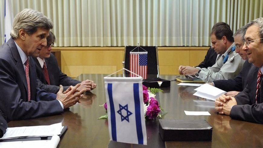Israel's Defence Minister Ehud Barak (R) meets U.S. Senator John Kerry (D-MA) (L) in Tel Aviv February 19, 2009, in this picture released by the Israeli Defence Ministry. The highest-ranking U.S. delegation to visit the Gaza Strip in years toured bomb-damaged buildings on Thursday and blamed the enclave's Hamas rulers for provoking Israel's wrath with cross-border rocket attacks.Senate Foreign Relations Committee Chairman Kerry and two members of the House of Representatives, Brian Baird and Keith Ellison, 