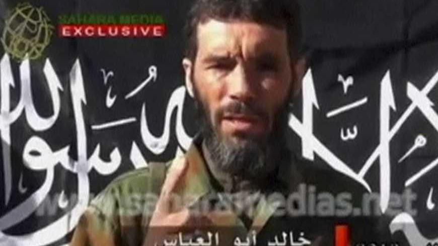 Veteran jihadist Mokhtar Belmokhtar speaks in this undated still image taken from a video released by Sahara Media on January 21, 2013. Belmokhtar has claimed responsibility in the name of al Qaeda for the Algerian hostage-taking, and his Mulathameen Brigade warned it would carry out further attacks on foreign interests unless the fighting in Mali stopped Mauritanian news website Sahara Media said on January 20. REUTERS/Sahara Media via Reuters TV  (ALGERIA - Tags: CIVIL UNREST CONFLICT TPX IMAGES OF THE DA