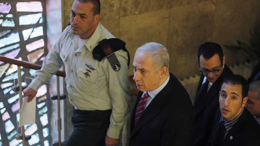 Israel's Prime Minister Benjamin Netanyahu (C) arrives to the weekly cabinet meeting in Jerusalem January 27, 2013. REUTERS/Ariel Schalit/Pool (JERUSALEM - Tags: POLITICS) - RTR3D101