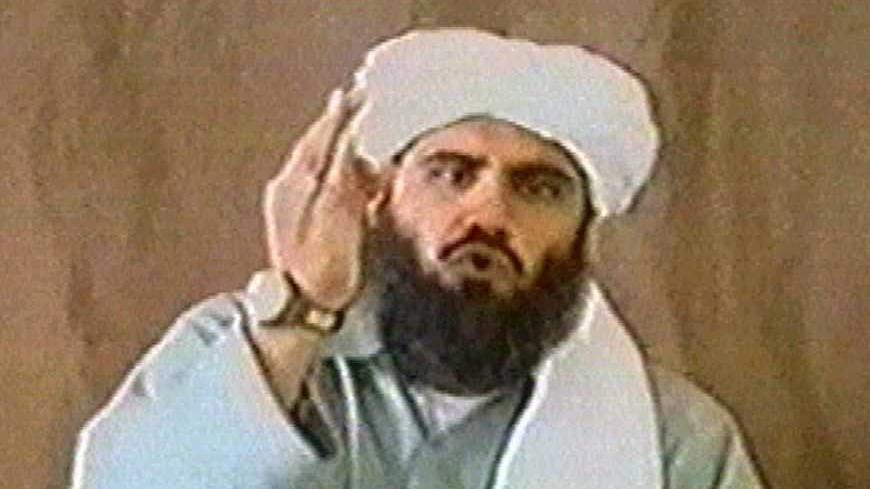 Footage from a video obtained by Reuters shows a man identified as al
Qaeda spokesman Suleiman Abu Gheith speaking into a camera, warning
American Muslims and opponents of American policy not to fly in
airplanes or live in tall buildings. The source who provided the video
to Reuters and a British Sunday newspaper said this and pictures of a
man identified as Osama bin Laden were filmed in March 2002. If
genuine, the film would provide the first proof that bin Laden survived
the U.S.-led onslaught on 