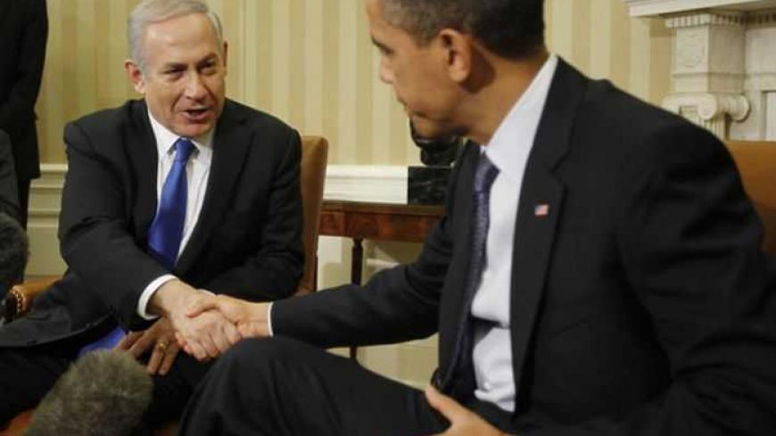 U.S. President Barack Obama (right) shakes hands with Israel's Prime Minister Benjamin Netanyahu during their meeting in the Oval Office of the White House in Washington, March 5, 2012.     REUTERS/Jason Reed   (UNITED STATES - Tags: POLITICS) - RTR2YVLP