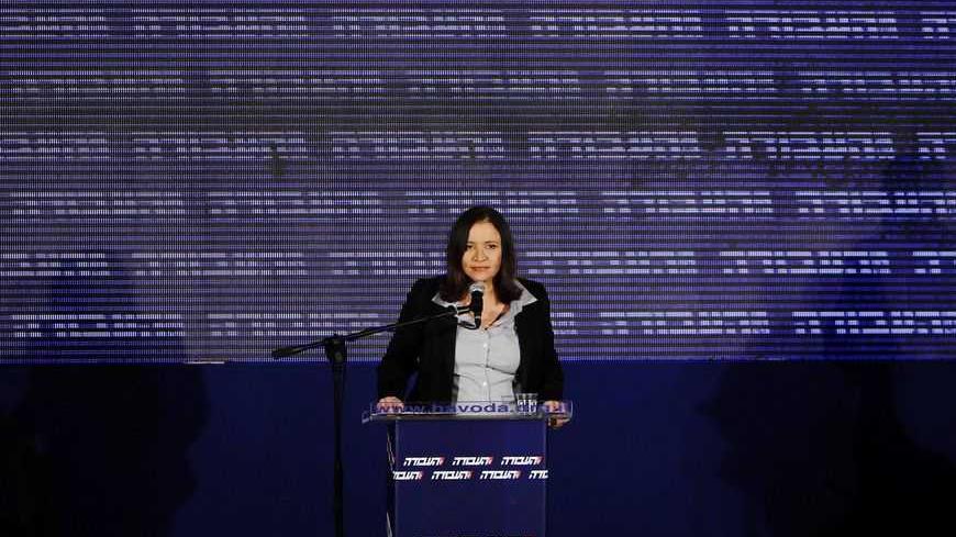 Labour party leader Shelly Yachimovich addresses supporters at her party's headquarters in Beit Berl, north of Tel Aviv January 23, 2013. Hawkish Prime Minister Benjamin Netanyahu emerged the bruised winner of Israel's election on Tuesday, claiming victory despite unexpected losses to resurgent centre-left challengers. REUTERS/Amir Cohen (ISRAEL - Tags: POLITICS ELECTIONS) - RTR3CTBL
