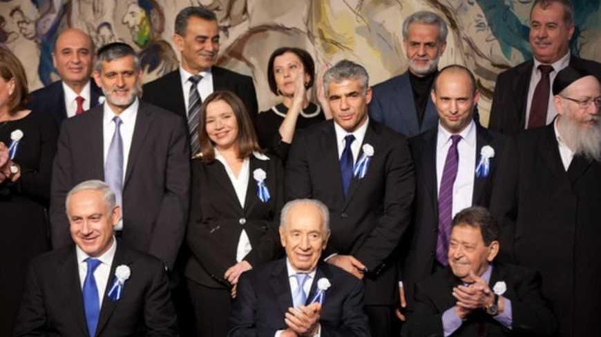 JERUSALEM, ISRAEL - FEBRUARY 05: Israeli Prime Minister Benjamin Netanyahu and Israeli president Shimon Peres pose for a photograph with the heads of the parties of the Knesset (Israeli parliament) during a reception marking the opening of the 19th Knesset on February 5, 2013 in Jerusalem, Israel.The 120 members of the Knesset included a record 48 new law makers.  (Photo by Uriel Sinai/Getty Images)