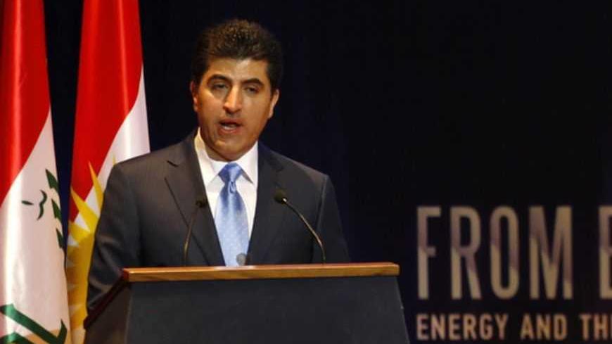 Kurdish Prime Minister Nechirvan Barzani speaks during the first International Energy Arena in Arbil, about 350 km (217 miles) north of Baghdad, May 20, 2012. Iraq's autonomous Kurdistan region expects to start exporting oil from its fields along a new pipeline to the Turkish border when the line is complete in August 2013, the region's natural resources minister Ashti Hawrami said on Sunday.   REUTERS/Thaier al-Sudani (IRAQ - Tags : - Tags: ENERGY POLITICS) - RTR32CEM