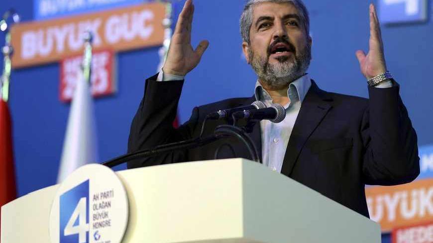 Hamas leader Khaled Meshaal makes a speech during the congress of Turkey's Prime Minister Tayyip Erdogan's ruling Justice and Development Party (AKP) in Ankara September 30, 2012. Erdogan trumpeted Turkey's credentials as a rising democratic power on Sunday, saying his Islamist-rooted ruling party had become an example to the Muslim world after a decade in charge. Leaders including Egyptian President Mohamed Mursi, Kyrgyz President Almazbek Atambayev and Masoud Barzani, president of Iraq's autonomous Kurdis