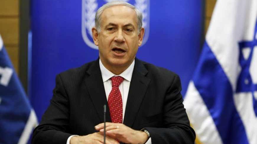 Israel's Prime Minister Benjamin Netanyahu gestures as he speaks during a Likud party meeting at the Knesset, the Israeli parliament, in Jerusalem April 22, 2013. REUTER/Baz Ratner (JERUSALEM - Tags: POLITICS) - RTXYVXD