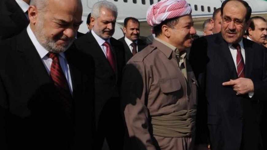 BAGHDAD - NOVEMBER 8:  In this handout image provided by the Iraqi Prime Minister office shows Kurdish leader Masoud Barazani (C) receiving Iraqi Prime Minister Nuri al-Maliki (R) and former Prime Minister and Shiite leader Ibrahim Al-Jaafari (L) on November 8, 2010 at Arbil airport 190 miles north of Baghdad, Iraq. Hosted by Kurdish leader Masoud Barazani, Iraqi political leaders met in Arbil to discuss the formation of the Iraqi government about eight months since the country's parliamentary elections.  (
