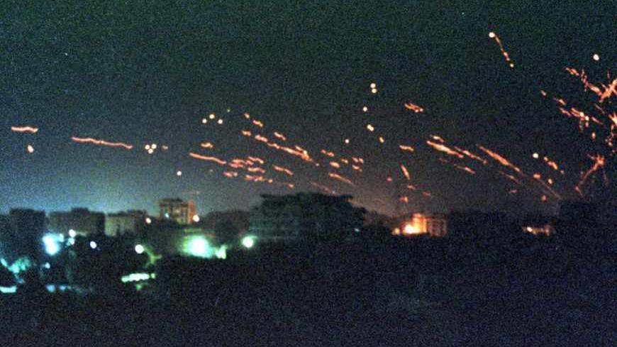 File photo of Iraqi anti-aircraft fire and tracer flares lighting up the sky
above downtown Baghdad January 17, 1991, as U.S. and allied bombing raids
launched a Gulf War to liberate Kuwait.        PP03030031   REUTERS/PATRICK
DE NOIRMONT

AC/CLH/ - RTRCUGB