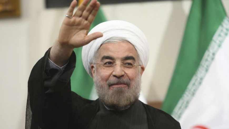 Iranian President-elect Hassan Rohani gestures to the media during a news conference in Tehran June 17, 2013. REUTERS/Fars News/Majid Hagdost  (IRAN - Tags: POLITICS PROFILE) ATTENTION EDITORS - THIS IMAGE WAS PROVIDED BY A THIRD PARTY. FOR  EDITORIAL USE ONLY. NOT FOR SALE FOR MARKETING OR ADVERTISING CAMPAIGNS. THIS PICTURE IS DISTRIBUTED EXACTLY AS RECEIVED BY REUTERS, AS A SERVICE TO CLIENTS - RTX10QWD