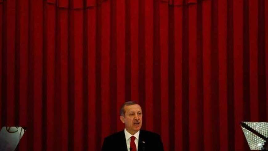 Turkey Prime Minister Tayyip Erdogan speaks during a conference in Ankara, June 18, 2013. REUTERS/Dado Ruvic (TURKEY - Tags: POLITICS CIVIL UNREST) - RTX10S1B