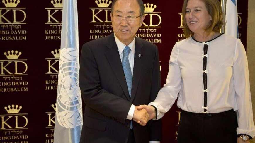 U.N. Secretary-General Ban Ki-moon and Israel's Justice Minister Tzipi Livni shake hands before their meeting in Jerusalem August 16, 2013. 
REUTERS/Sebastian Scheiner/Pool (JERUSALEM - Tags: POLITICS) - RTX12NEC