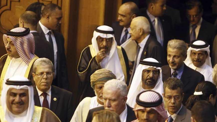 Arab foreign ministers arrive to an emergency meeting to discuss the Syrian crisis and the potential military strike on President Bashar al-Assad's regime, at the Arab League headquarters in Cairo, September 1, 2013. Saudi Arabia told fellow Arab League states on Sunday that opposing international intervention against the Syrian government would only encourage Damascus to use weapons of mass destruction. REUTERS/Amr Abdallah Dalsh  (EGYPT - Tags: POLITICS CIVIL UNREST) - RTX1341M