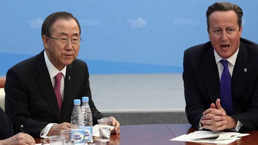 British Prime Minister David Cameron (R) and U.N. Secretary-General Ban Ki-moon attend a meeting on the humanitarian situation in Syria at the G20 summit in St Petersburg, September 6, 2013. REUTERS/Sergei Karpukhin (RUSSIA - Tags: POLITICS) - RTX139AN
