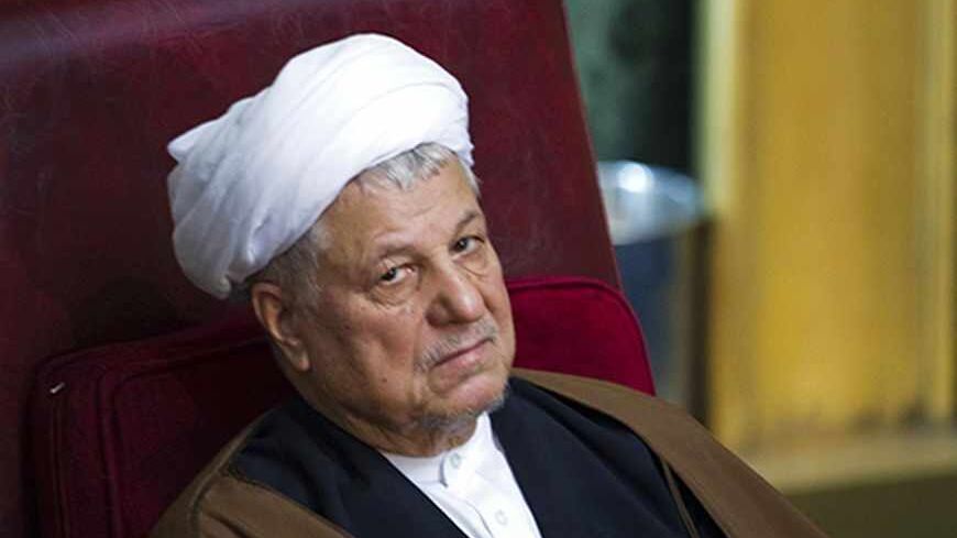 EDITORS' NOTE: Reuters and other foreign media are subject to Iranian restrictions on leaving the office to report, film or take pictures in Tehran.

Former Iranian president Akbar Hashemi Rafsanjani attends Iran's Assembly of Experts' biannual meeting in Tehran March 8, 2011. Rafsanjani lost his position on Tuesday as head of an important state clerical body after hardliners criticised him for being too close to the reformist opposition. REUTERS/Raheb Homavandi (IRAN - Tags: POLITICS) - RTR2JLJT