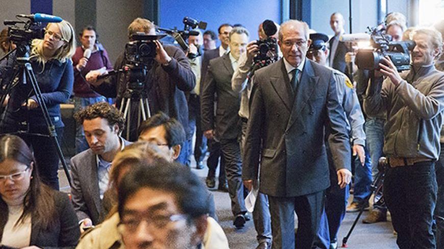 Organisation for the Prohibition of Chemical Weapons (OPCW) Director General Ahmet Uzumcu arrives at a news conference in The Hague October 11, 2013. The OPCW, which is overseeing the destruction's of Syria's arsenal, won the Nobel Peace Prize, the Norwegian Nobel Committee on Friday. Set up in 1997 to eliminate all chemicals weapons worldwide, its mission gained critical importance this year after a sarin gas strike in the suburbs of Damascus killed more than 1,400 people in August. REUTERS/Michel Kooren (