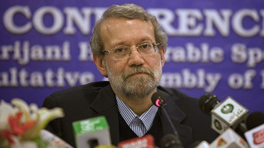 Iran's Parliament speaker Ali Larijani attends a news conference in Islamabad Frbruary 12, 2013. Larijani is in Pakistan to attend the first Speakers Conference of Parliamentary Association of ECO Countries (PAECO). REUTERS/Faisal Mahmood (PAKISTAN - Tags: POLITICS) - RTR3DOPH