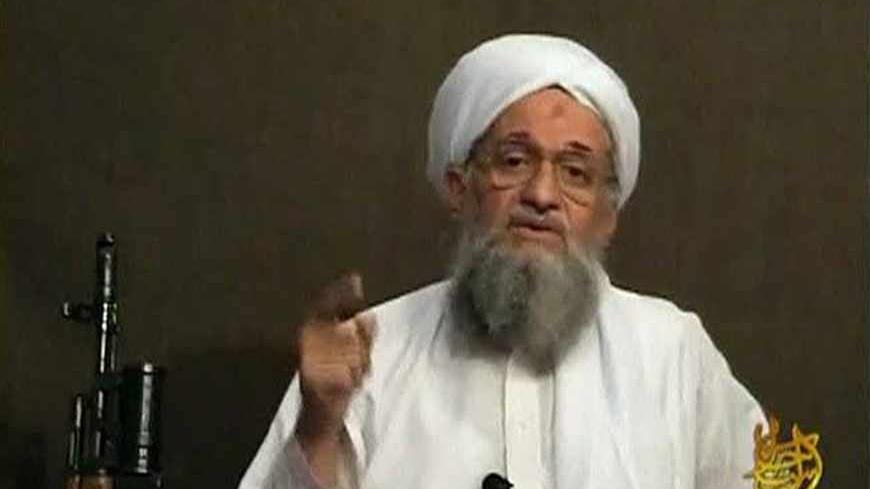 EDITOR'S NOTE: REUTERS IS UNABLE TO INDEPENDENTLY VERIFY CONTENT THE VIDEO FROM WHICH THIS STILL IMAGE WAS TAKEN. 
Al Qaeda's second-in-command Ayman al-Zawahri speaks from an unknown location, in this still image taken from video uploaded on a social media website June 8, 2011. Osama bin Laden's longtime lieutenant, Ayman al-Zawahri, said the United States faces rebellion throughout the Muslim world after killing the al Qaeda leader, according to a 28-minute YouTube recording posted on Wednesday. In what a