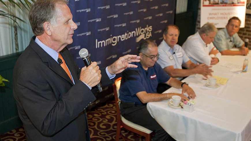 U.S. Republican Congressman Ted Poe, a Representative of Texas, talks with business leaders at a breakfast forum on what Houston employers need from immigration reform, sponsored by ImmigrationWorks USA, in Houston August 20, 2013. As lawmakers return to their home districts in the final weeks of summer, hundreds of U.S. businesses have quietly mobilized to persuade Republicans such as Poe that an immigration overhaul is broadly supported by their constituents, even if some conservative activists loudly obj
