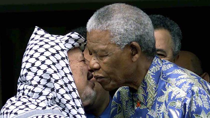 Former South African president Nelson Mandela (R) and Palestinian President Yasser Arafat (L) take leave of one another after holding a meeting on the crisis in the Middle East May 3, 2001. Arafat is in south Africa to attend the Non-Aligned Movement (NAM) meeting on Palestine, and also to inform President Thabo Mbeki about developments on the Middle East.

JN/WS - RTRHQJQ