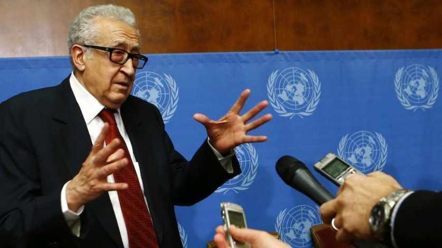 Arab League-United Nations envoy Lakhdar Brahimi gestures while answering journalists' questions at the end of a news conference after a meeting on Syria at the United Nations European headquarters in Geneva December 20, 2013.   REUTERS/Denis Balibouse (SWITZERLAND - Tags: POLITICS) - RTX16PPL