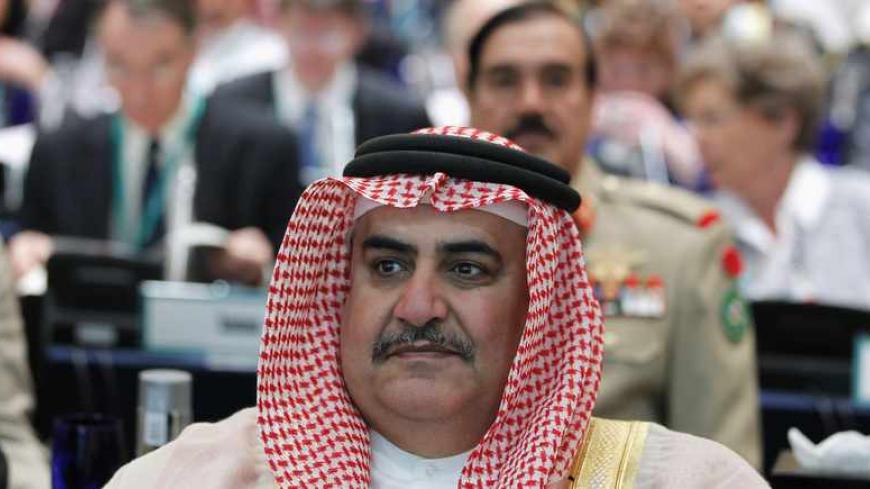 Bahrain's Foreign Minister Sheikh Khalid bin Ahmed al-Khalifa attends the IISS Regional Security Summit - The Manama Dialogue, in Manama, December 7, 2013. The United States has a proven and enduring commitment to Middle East security, backed by diplomatic engagement and a fierce array of warplanes, ships, tanks, artillery and 35,000 troops, U.S. Defense Secretary Chuck Hagel told Gulf Arab leaders on Saturday. REUTERS/Hamad I Mohammed (BAHRAIN - Tags: POLITICS MILITARY) - RTX167RU