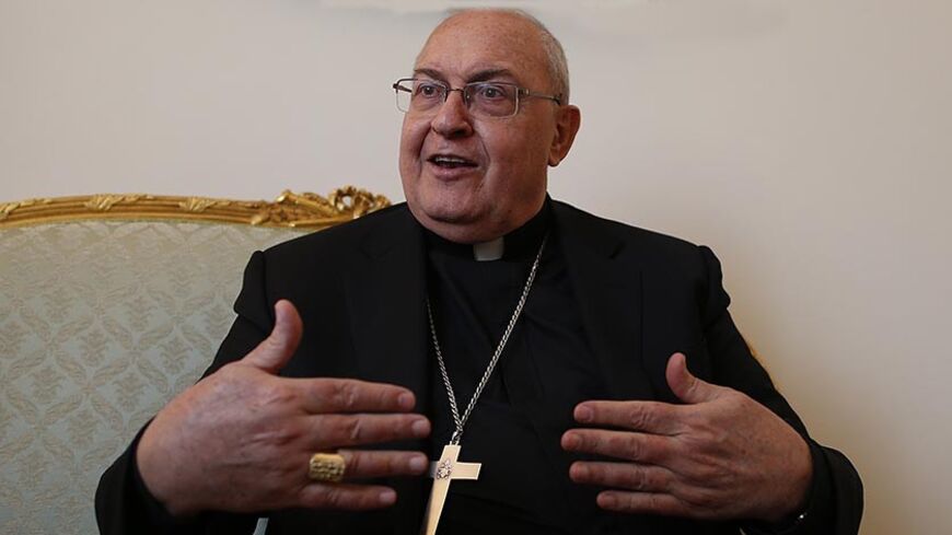 Cardinal Leonardo Sandri gestures during an interview with Reuters in Rome, March 2, 2013.  In an exclusive interview with Reuters, Cardinal Leonardo Sandri, 69, an Argentine, said the next pope should not be chosen according to a geographic area but must be a "saintly man" who is "best qualified" to lead the Church in a time of crisis. Picture taken March 2, 2013. REUTERS/Tony Gentile (ITALY - Tags: RELIGION) - RTR3EIJ3