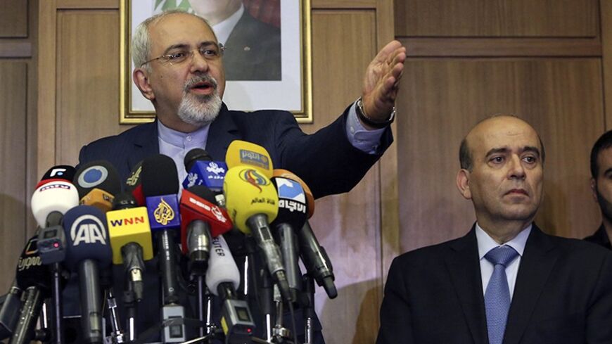 Iran's Foreign Minister Mohammad Javad Zarif makes a speech upon his arrival at Beirut international airport January 12, 2013. REUTERS/Hasan Shaaban (LEBANON - Tags: POLITICS) - RTX17B1Y