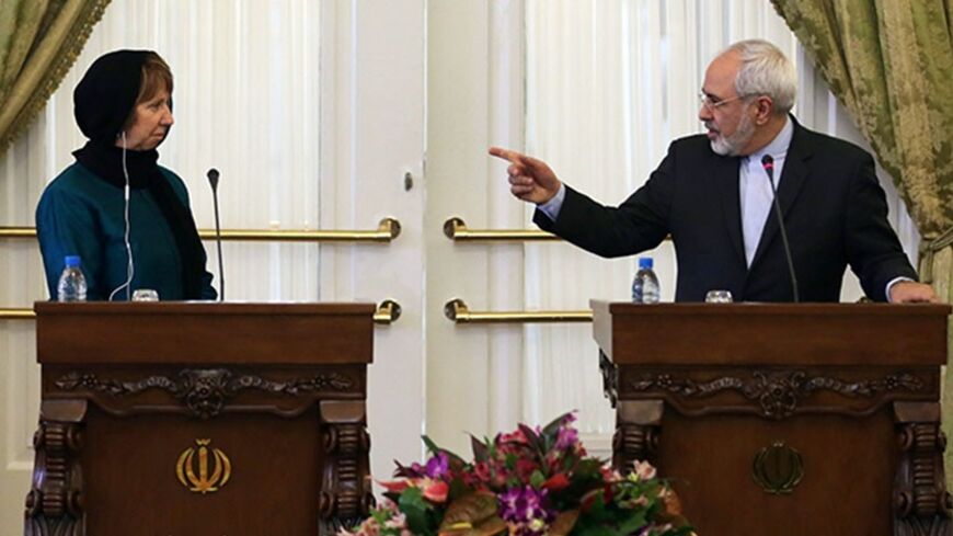 EU foreign affairs chief Catherine Ashton (L), who coordinates nuclear talks between Tehran and world powers and Iranian Foreign Minister Mohammad Javad Zarif give a joint press conference following a meeting on March 9, 2014 in Tehran. Ashton is in Iran for top-level meetings with officials who are pursuing a track of talks they hope will eventually end international pressure and suspicions over Tehran's nuclear programme.    AFP PHOTO / ATTA KENARE        (Photo credit should read ATTA KENARE/AFP/Getty Im