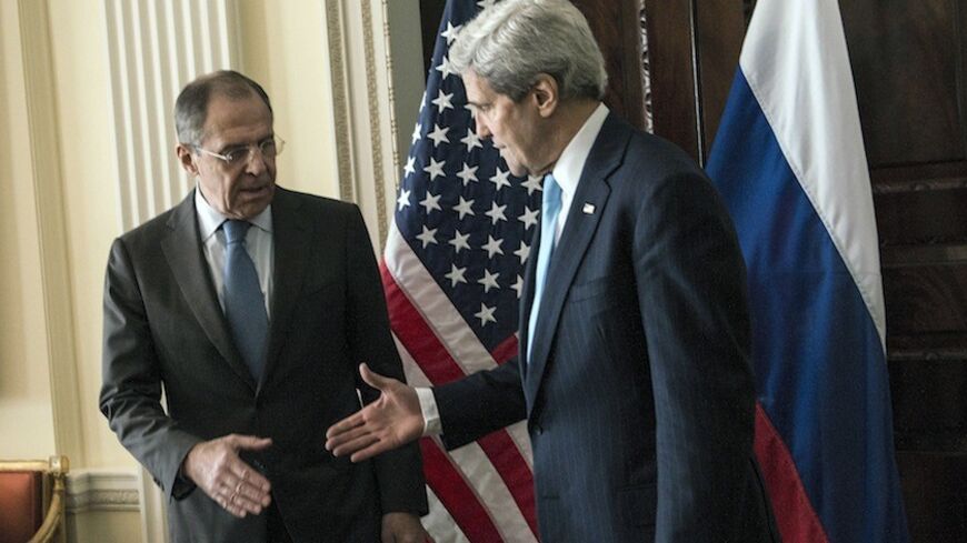 U.S. Secretary of State John Kerry (R) shakes hands with Russia's Foreign Minister Sergei Lavrov before their meeting at Winfield House, the home of the U.S. ambassador in London March 14, 2014. The United States and Russia will find it formidably difficult to make progress on Ukraine at talks in London today, British Foreign Minister William Hague said on Friday. REUTERS/Brendan Smialowski/pool  (BRITAIN - Tags: POLITICS TPX IMAGES OF THE DAY) - RTR3H3AB
