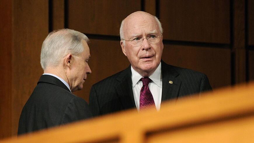 Ranking member Senator Jeff Sessions (R-AL) (L) and Chairman Patrick Leahy (D-VT) confer during the third day of U.S. Supreme Court nominee Elena Kagan's U.S. Senate confirmation hearings in front of the Senate Judiciary Committee on Capitol Hill in Washington, June 30, 2010. REUTERS/Jonathan Ernst (UNITED STATES - Tags: POLITICS CRIME LAW) - RTR2FY7V